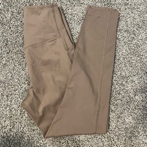 Girlfriend Collective compressive high rise leggings with pockets, 23 3/4”